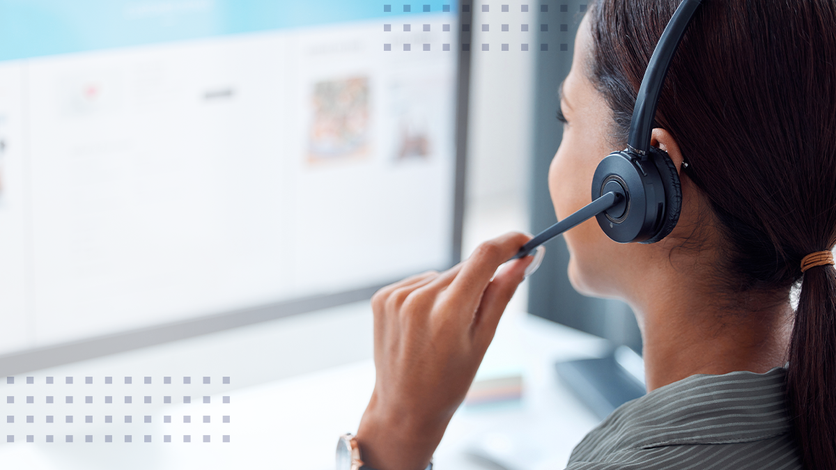 a businesswoman working in a call center using a headphone